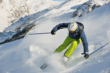 Image showing skiing on fresh snow at winter season at beautiful sunny day