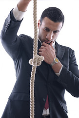 Image showing business man with rope isolated on white background