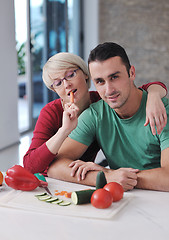 Image showing young couple have fun in modern kitchen