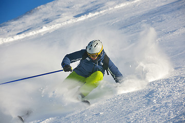 Image showing skiing on fresh snow at winter season at beautiful sunny day