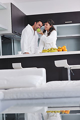 Image showing young couple have fun in modern kitchen