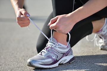 Image showing Young beautiful  woman jogging at morning in park