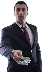 Image showing Business man holding money