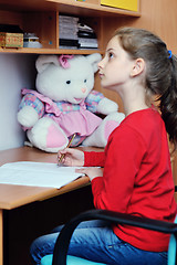 Image showing girl doing homework