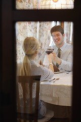 Image showing young couple having dinner at a restaurant