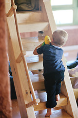 Image showing beautiful young child making first steps