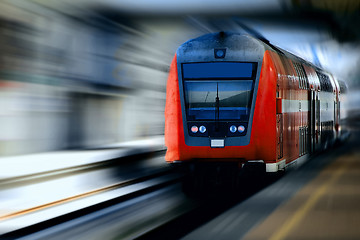 Image showing Fast moving red train