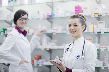 Image showing team of pharmacist chemist woman  in pharmacy drugstore