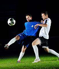 Image showing football players in action for the ball