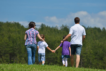 Image showing happy young family have fun outdoors