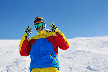 Image showing skiing on fresh snow at winter season at beautiful sunny day