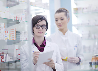 Image showing team of pharmacist chemist woman  in pharmacy drugstore