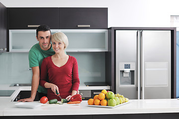 Image showing young couple have fun in modern kitchen