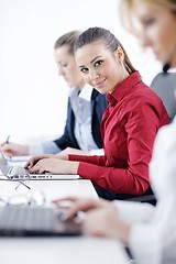 Image showing business woman group with headphones