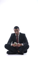 Image showing Business man holding money