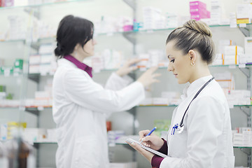 Image showing team of pharmacist chemist woman  in pharmacy drugstore