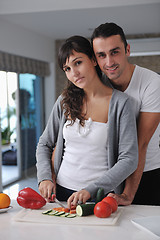 Image showing young couple have fun in modern kitchen