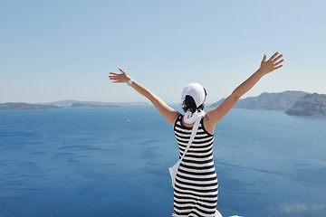 Image showing Greek woman on the streets of Oia, Santorini, Greece