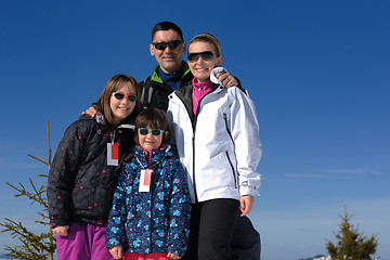 Image showing portrait of happy young family at winter