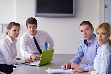 Image showing business people in a meeting at office