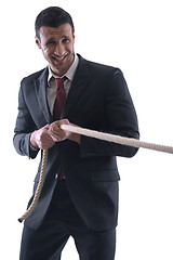 Image showing business man with rope isolated on white background