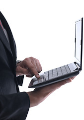 Image showing business man work on mini laptop