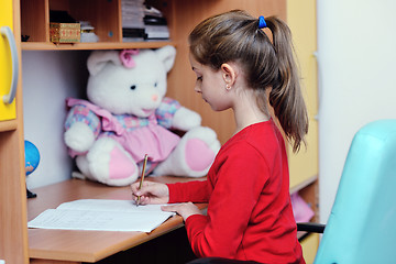 Image showing girl doing homework