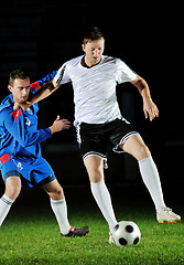 Image showing football players in action for the ball