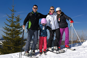 Image showing portrait of happy young family at winter