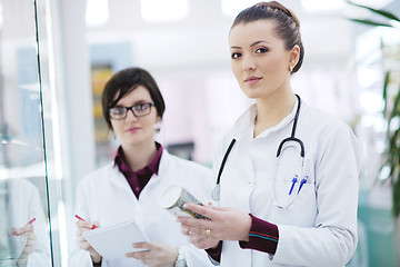 Image showing team of pharmacist chemist woman  in pharmacy drugstore