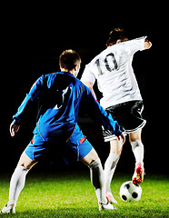 Image showing football players in action for the ball