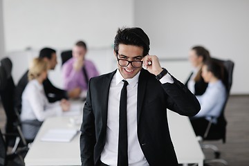 Image showing young business man at meeting