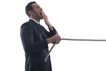 Image showing business man with rope isolated on white background