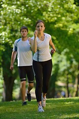 Image showing Young couple jogging