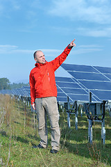 Image showing Male solar panel engineer at work place