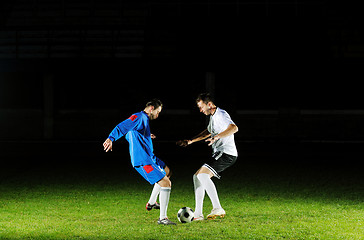 Image showing football players in action for the ball