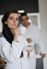 Image showing Young love couple taking fresh morning cup of coffee