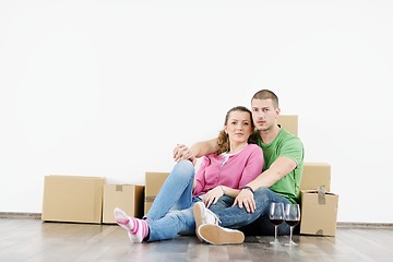 Image showing Young couple moving in new house