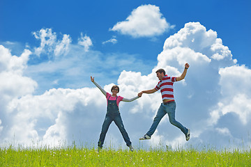 Image showing Portrait of romantic young couple smiling together outdoor