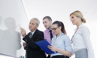 Image showing Senior business man giving a presentation