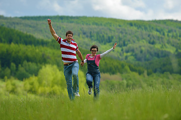 Image showing romantic young couple in love together outdoor