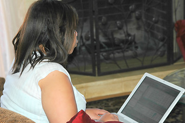 Image showing Female using the internet