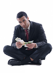 Image showing Business man holding money