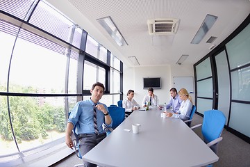 Image showing business people in a meeting at office