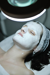 Image showing woman with facial mask in cosmetic studio