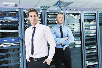 Image showing it enineers in network server room