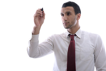 Image showing business man draw with marker on empty space