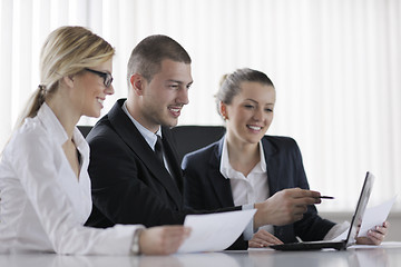 Image showing business people in a meeting at office