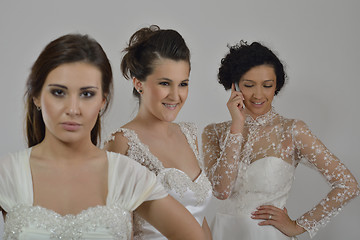 Image showing portrait of a three beautiful woman in wedding dress