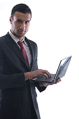 Image showing business man work on mini laptop